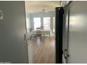 Open dining area with table under fan light and lots of natural light coming through the windows at 7750 E Broadway Rd # 212, Mesa, AZ 85208
