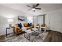 Relaxing living room with a soft rug, comfy seating and neutral colors at 1331 W Baseline Rd # 106, Mesa, AZ 85202