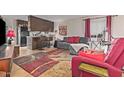 Inviting living room with a comfortable sofa, area rug, and an open layout at 6240 N 16Th St # 37, Phoenix, AZ 85016