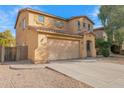 Charming two-story home with a two-car garage and low maintenance desert landscaping at 43524 W Bailey Dr, Maricopa, AZ 85138