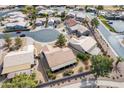 Aerial view of a residential neighborhood with well-maintained homes and landscaping at 6450 S Windstream Pl, Chandler, AZ 85249