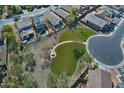 Beautiful aerial view of homes and a lush green common area, perfect for recreation and relaxation at 6614 W Victory N Way, Florence, AZ 85132