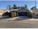 Charming single-story home featuring a spacious driveway and a well-maintained front yard at 7551 W Pasadena Ave, Glendale, AZ 85303