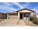 Charming single-story home with a two-car garage, well-manicured landscaping, and a welcoming entryway at 3890 E Dublin St, Gilbert, AZ 85295