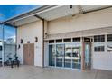 Exterior view of home with double door front entry and tandem carport at 17200 W Bell Rd # 845, Surprise, AZ 85374