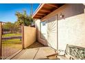 Private gated courtyard with a seating area, providing a tranquil outdoor space at 2140 E Rosarita Dr, Tempe, AZ 85281