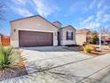 Lovely single-Gathering home with a two-car garage and low-maintenance desert landscaping at 25601 W Coles Rd, Buckeye, AZ 85326