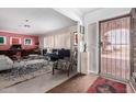 Cozy entry way showcasing the decor, wood floors, and a glimpse of the stylish living space at 3279 E Selma Hwy, Casa Grande, AZ 85194