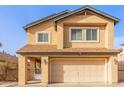 Charming two-story home with a two-car garage and covered entryway at 921 S Val Vista Dr # 59, Mesa, AZ 85204