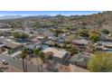 An aerial view of a home with mountain views and desert landscaping at 17309 E Rosita Dr, Fountain Hills, AZ 85268