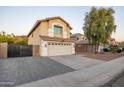 Attractive two-story home featuring a spacious two-car garage and desert landscape at 2226 E Parkside Ln, Phoenix, AZ 85024