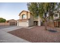 Beautiful two-story home with a well-kept lawn, two-car garage, and cozy front porch at 2226 E Parkside Ln, Phoenix, AZ 85024