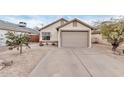 Charming single-story home featuring a one car garage and desert landscaping for low maintenance appeal at 3147 E Michigan Ave, Phoenix, AZ 85032