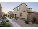 Attractive home showcasing well-maintained landscaping, neutral tones, and clean architectural lines at 3911 S 79Th Ln, Phoenix, AZ 85043