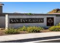 Elegant stone community sign at San Tan Groves with desert landscaping and a welcoming entrance at 4340 W Jeanette Ln, San Tan Valley, AZ 85144