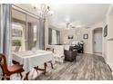 Inviting dining area adjacent to a comfortable living space, bathed in natural light at 5303 N 7Th St # 114, Phoenix, AZ 85014