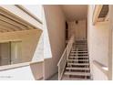 Exterior stairwell of a condo featuring a beige facade at 616 S Hardy Dr # 220, Tempe, AZ 85281