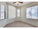 Bright bedroom with natural light and tile flooring at 6557 W Puget Ave, Glendale, AZ 85302