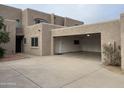 Attached two-car garage with a spacious driveway and close proximity to the front entry at 4107 E Charter Oak N Rd, Phoenix, AZ 85032