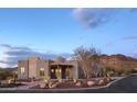 Stunning desert home with drought tolerant landscaping and a tiled roof at 6038 E Agave Cir, Carefree, AZ 85377