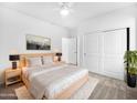 Calming main bedroom with a neutral palette, plush rug, and ample closet space at 10064 E Tamery Ave, Mesa, AZ 85212