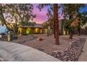 Beautiful modern home featuring xeriscaping, desert landscaping, and accent lighting in the front yard at 122 E Loma Vista Dr, Tempe, AZ 85282