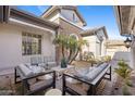 Relaxing outdoor courtyard with stylish seating and potted succulent at 253 W Malibu Dr, Chandler, AZ 85248