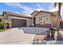 Lovely single-story home with attached garage and a wide concrete driveway at 3095 E Cardinal Ct, Chandler, AZ 85286