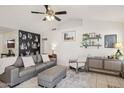 Open concept living room with vaulted ceilings, ceiling fan, and modern decor at 510 S Kenwood Ln, Chandler, AZ 85226