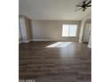 The living room has a ceiling fan and attractive vinyl floors at 849 W Spur Ave, Gilbert, AZ 85233