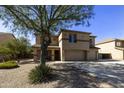 Charming two-story home features desert landscaping and neutral stucco exterior at 3423 E Superior Rd, San Tan Valley, AZ 85143