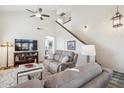 Inviting living room featuring a neutral color palette, plush seating, and a staircase leading to the upper level at 6230 S Mesa Vista Dr, Gold Canyon, AZ 85118