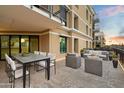 Comfortable patio featuring modern seating and dining arrangements with scenic vistas at 6803 E Main St # 2210, Scottsdale, AZ 85251