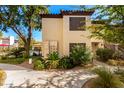 Charming condo with beautiful landscaping and a lovely walkway leading to the entrance at 9990 N Scottsdale Rd # 2049, Paradise Valley, AZ 85253