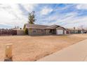 Lovely single-story home features desert landscaping and a two-car garage in a quiet neighborhood at 2643 E Jerome Ave, Mesa, AZ 85204