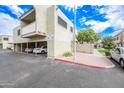 Exterior of a home with assigned covered parking at 4867 W Palo Verde Dr, Glendale, AZ 85301