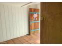 Entryway featuring decorative walls, tile floor, and colorful front door at 537 N Jay St, Chandler, AZ 85225