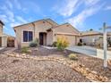 Charming single story home with desert landscaping and a two-car garage at 6847 W Palo Brea Ln, Peoria, AZ 85383