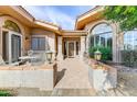 Charming front porch with tiled patio and elegant entrance, perfect for outdoor seating at 25628 N Cordova Ln, Rio Verde, AZ 85263