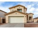 Inviting two-story home featuring a spacious two-car garage and a well-maintained, low maintenance landscape at 25724 W St James Ave, Buckeye, AZ 85326