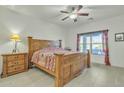 Relaxing main bedroom featuring a ceiling fan, lots of natural light, and ample closet space at 18230 E El Viejo Desierto --, Gold Canyon, AZ 85118