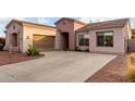 Beautiful home showcasing a spacious driveway, desert landscaping, and a welcoming exterior at 1919 E Gary Way, Phoenix, AZ 85042