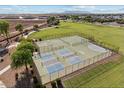 This community offers fenced pickleball, tennis, and basketball courts for active residents at 37295 W Cannataro Ln, Maricopa, AZ 85138