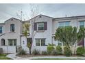 Charming two-story townhome with landscaped front yard, walkway, and gated entrance at 4077 S Sabrina Dr # 107, Chandler, AZ 85248