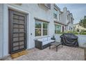 Outdoor seating area with a comfortable couch and grill, perfect for relaxation at 4077 S Sabrina Dr # 107, Chandler, AZ 85248