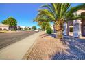 Inviting neighborhood street view showcasing well-maintained homes and mature trees at 5031 S Roosevelt St, Tempe, AZ 85282