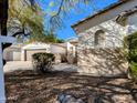 Charming single-story home with a well-maintained yard and a two-car garage at 6016 W Gambit Trl, Phoenix, AZ 85083