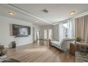 Spacious living room with hardwood floors, recessed lighting, and white trim at 6251 E Hannibal St, Mesa, AZ 85205