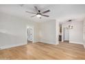 Inviting living room with newly installed floors, neutral walls, and modern ceiling fan at 137 N Robson St # 2, Mesa, AZ 85201