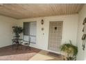 Welcoming front porch with a decorative door, cozy seating, and ample natural light at 4434 W Dahlia Dr, Glendale, AZ 85304
